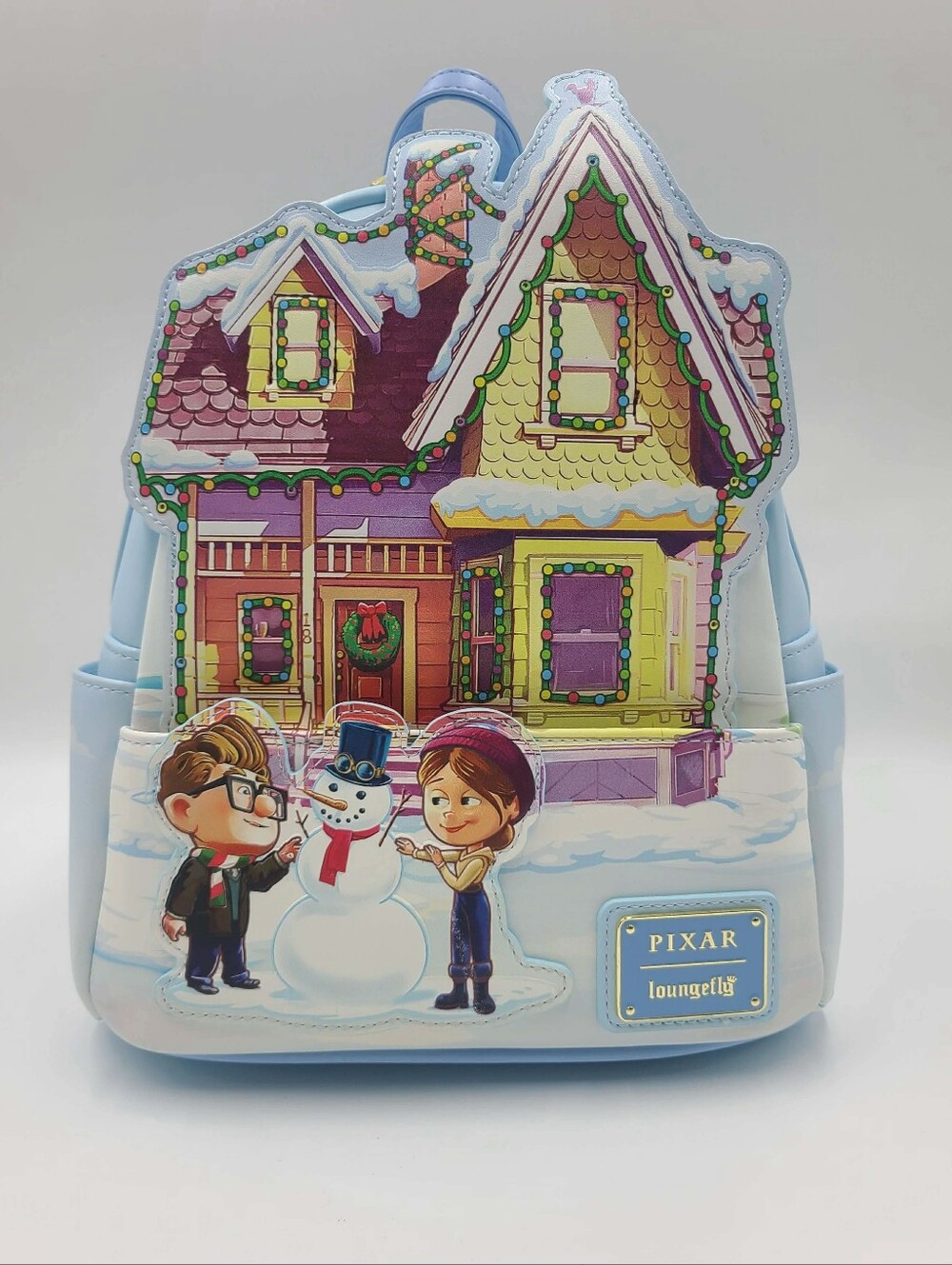 Embark on a magical winter journey with the Loungefly Pixar Up House Christmas